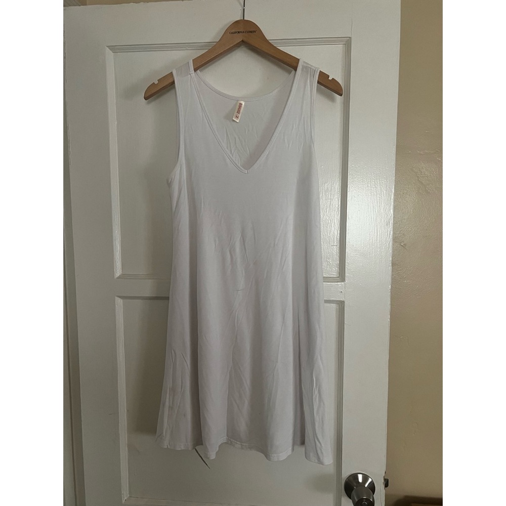 Cute white mini dress with pockets